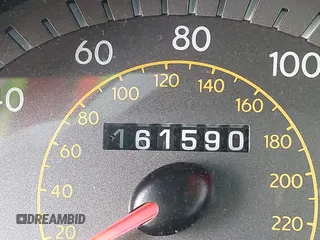 2000 Hyundai Tiburon z VIN KMHJG35F5YU191588, wystawiony jako IAAI lot #41934653 z przebiegiem 161 590 mil mil oraz . Historia ofert i sprzedaży dostępna na DreamBid. Obrazek 11.