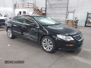 2012 Volkswagen CC Sport PZEV with VIN WVWMP7AN8CE537805, listed as a IAAI auction lot 41847051 with 147,095 mi miles. Bid and sale history available at carsss.com. Image 1.