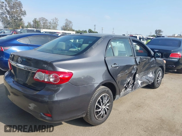 2011 Toyota Corolla L with VIN JTDBU4EE3BJ090749, listed as a IAAI auction lot 42106633 with 209,824 mi miles. Bid and sale history available at carsss.com. Image 4.