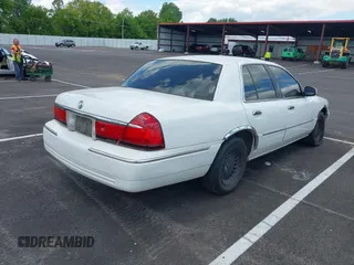 2001 Mercury Grand Marquis LS with VIN 2MEFM75W71X614856, listed as a IAAI auction lot 42195921 with 113,352 mi miles and . Bid and sale history available at DreamBid. Image 4.