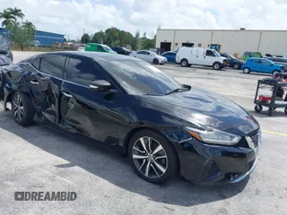 2020 Nissan Maxima SV with VIN 1N4AA6CV9LC370786, listed as a IAAI auction lot 41957180 with 90,835 mi miles. Bid and sale history available at carsss.com. Image 1.
