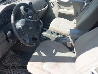2005 Jeep Liberty Sport with VIN 1J4GL48545W655788, listed as a IAAI auction lot 41914703 with 166,899 mi miles and . Bid and sale history available at carsss.com. Image 13.