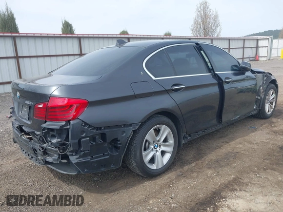 2014 BMW 5 Series 528i xDrive with VIN WBA5A7C55ED617099, listed as a IAAI auction lot 42003348 with 85,262 mi miles and . Bid and sale history available at DreamBid. Image 4.