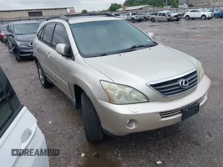 2006 Lexus RX 400h with VIN JTJHW31U060004642, listed as a IAAI auction lot 42207589 with 158,506 mi miles and . Bid and sale history available at DreamBid. Image 1.
