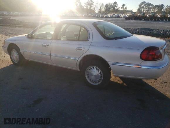 1998 Lincoln Continental with VIN 1LNFM97V3WY647762, listed as a Copart auction lot 77062294 with 153,553 mi miles and Salvage Title. Bid and sale history available at carsss.com. Image 2.