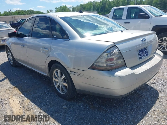 2008 Ford Taurus SEL z VIN 1FAHP24W28G186822, wystawiony jako IAAI lot #42173076 z przebiegiem 243 849 mil mil oraz . Historia ofert i sprzedaży dostępna na DreamBid. Obrazek 3.