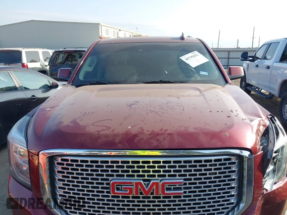 2017 GMC Yukon Denali with VIN 1GKS1CKJ4HR141145, listed as a IAAI auction lot 40799652 with 104,369 mi miles. Bid and sale history available at carsss.com. Image 10.