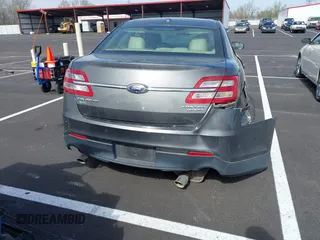 2016 Ford Taurus Limited with VIN 1FAHP2F81GG113289, listed as a IAAI auction lot 41883906 with 166,682 mi miles and . Bid and sale history available at DreamBid. Image 16.