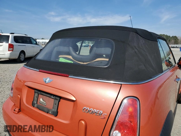 2006 MINI Convertible S with VIN WMWRH33576TF89127, listed as a Copart auction lot 49763365 with 150,446 mi miles and Salvage title. Bid and sale history available at DreamBid. Image 10.