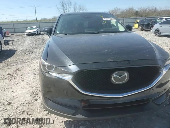 2020 Mazda CX-5 Touring with VIN JM3KFACM9L0733719, listed as a Copart auction lot 48695555 with 93,092 mi miles and Salvage Title. Bid and sale history available at carsss.com. Image 11.