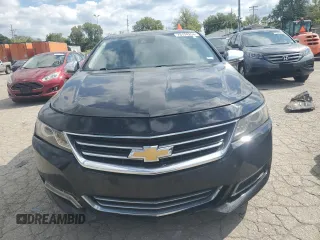 2014 Chevrolet Impala LTZ with VIN 1G1155S38EU169167, listed as a Copart auction lot 73174254 with 156,884 mi miles and Salvage Title. Bid and sale history available at DreamBid. Image 5.