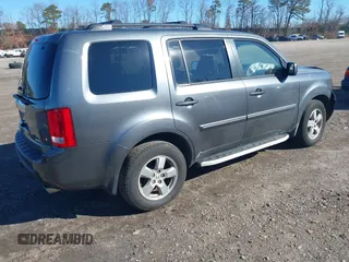 2011 Honda Pilot EX-L with VIN 5FNYF4H51BB027978, listed as a IAAI auction lot 41721429 with 111,281 mi miles. Bid and sale history available at carsss.com. Image 4.