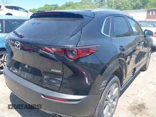 2022 Mazda CX-30 S Carbon Edition with VIN 3MVDMBCL3NM440188, listed as a IAAI auction lot 42259723 with 48,555 mi miles and . Bid and sale history available at DreamBid. Image 4.