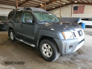 2013 Nissan Xterra S with VIN 5N1AN0NW7DN818218, listed as a Copart auction lot 59329255 with 122,697 mi miles and Salvage title. Bid and sale history available at DreamBid. Image 4.