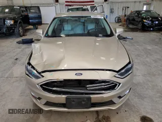 2017 Ford Fusion Hybrid Titanium with VIN 3FA6P0RU3HR360053, listed as a Copart auction lot 63063715 with 127,534 mi miles and Non repairable. Bid and sale history available at DreamBid. Image 5.