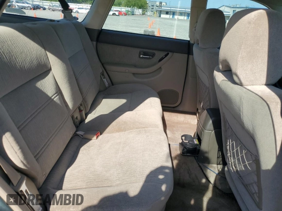 2002 Subaru Legacy Outback z VIN 4S3BH665527618156, wystawiony jako Copart lot #65384565 z przebiegiem 169 600 mil mil oraz Szkoda całkowita • Salvage title. Historia ofert i sprzedaży dostępna na DreamBid. Obrazek 11.