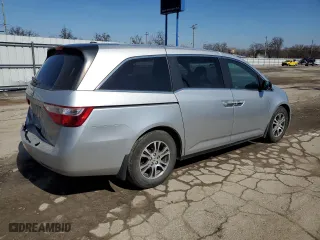 2012 Honda Odyssey EX-L with VIN 5FNRL5H62CB117931, listed as a Copart auction lot 48454915 with 155,600 mi miles and Salvage Title. Bid and sale history available at carsss.com. Image 3.
