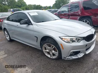 2016 BMW 4 Series 428i xDrive z VIN WBA4C9C57GG137858, wystawiony jako IAAI lot #42755021 z przebiegiem 92 728 mil mil oraz . Historia ofert i sprzedaży dostępna na DreamBid. Obrazek 1.