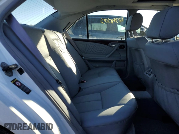 2000 Mercedes-Benz E-Class AWD with VIN WDBJF82G1YX028712, listed as a Copart auction lot 43983315 with 201,037 mi miles and Salvage Title. Bid and sale history available at carsss.com. Image 10.