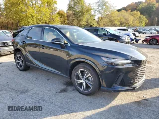 2023 Lexus RX with VIN 2T2BAMCA2PC013409, listed as a Copart auction lot 71721004 with 10,615 mi miles and Salvage Title. Bid and sale history available at carsss.com. Image 4.