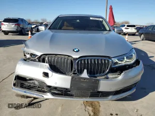 2018 BMW 7 Series 750i with VIN WBA7F0C57JGM23653, listed as a Copart auction lot 43462555 with 62,853 mi miles and Salvage Title. Bid and sale history available at carsss.com. Image 5.