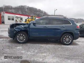 2021 Jeep Cherokee Latitude Lux z VIN 1C4PJMMX7MD201810, wystawiony jako IAAI lot #41235714 z przebiegiem 52 327 mil mil oraz . Historia ofert i sprzedaży dostępna na DreamBid. Obrazek 15.