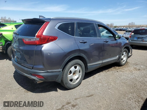 2019 Honda CR-V Touring with VIN 2HKRW2H90KH149664, listed as a Copart auction lot 52019525 with 147,649 mi miles and Salvage Title. Bid and sale history available at DreamBid. Image 3.