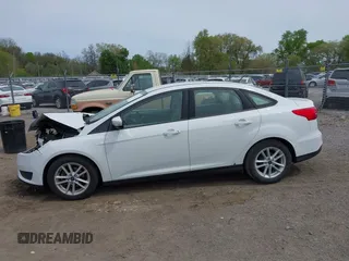 2016 Ford Focus SE with VIN 1FADP3F21GL403121, listed as a IAAI auction lot 42130743 with 103,592 mi miles and . Bid and sale history available at DreamBid. Image 14.
