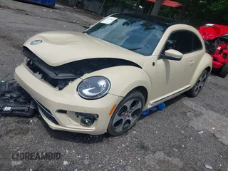 2019 Volkswagen Beetle S with VIN 3VWFD7AT2KM700941, listed as a IAAI auction lot 42474867 with 43,891 mi miles and . Bid and sale history available at DreamBid. Image 2.