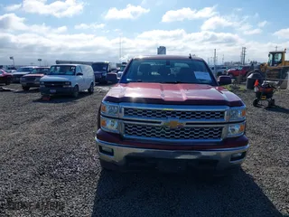 2015 Chevrolet Silverado 1500 LT with VIN 3GCUKREC0FG263001, listed as a IAAI auction lot 41735790 with 266,727 mi miles. Bid and sale history available at carsss.com. Image 12.