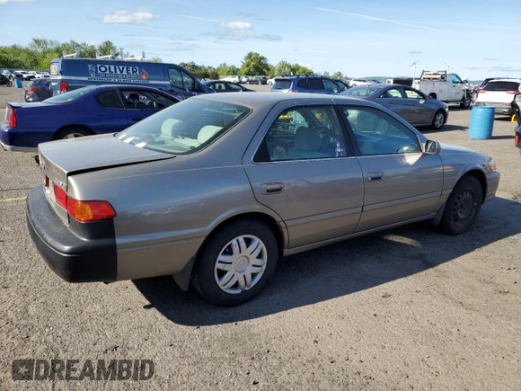 2000 Toyota Camry CE z VIN 4T1BG22K0YU692937, wystawiony jako Copart lot #57456985 z przebiegiem 116 617 mil mil oraz Szkoda całkowita • Salvage title. Historia ofert i sprzedaży dostępna na DreamBid. Obrazek 3.