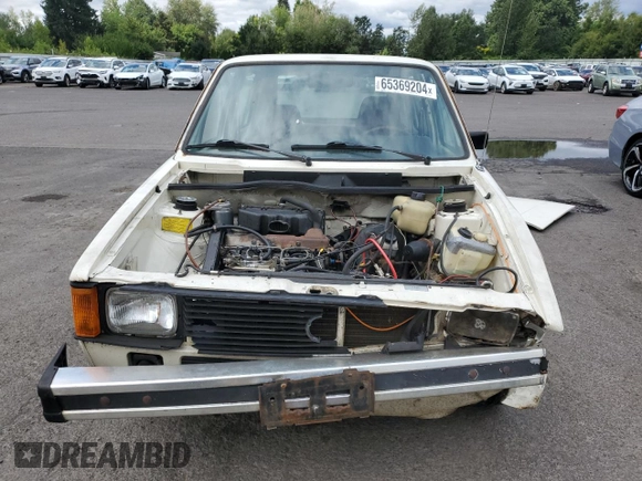 1981 Volkswagen Rabbit z VIN 1VWFG0179BV177022, wystawiony jako Copart lot #65369204 z przebiegiem 168 444 mil mil oraz Szkody całkowita. Historia ofert i sprzedaży dostępna na DreamBid. Obrazek 5.