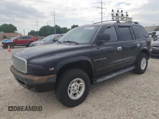 2000 Dodge Durango z VIN 1B4HS28Z1YF166514, wystawiony jako Copart lot #60993335 z przebiegiem 152 755 mil mil oraz Szkoda całkowita • Salvage title. Historia ofert i sprzedaży dostępna na DreamBid. Obrazek 1.