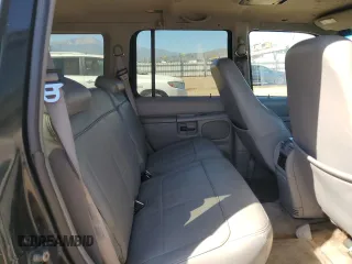 1997 Mercury Mountaineer z VIN 4M2DU52P5VUJ58731, wystawiony jako Copart lot #69710404 z przebiegiem 266 522 mil mil oraz Tytuł czysty. Historia ofert i sprzedaży dostępna na DreamBid. Obrazek 11.