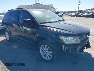 2016 Dodge Journey SXT with VIN 3C4PDCBGXGT123087, listed as a IAAI auction lot 41869667 with 256,583 mi miles. Bid and sale history available at carsss.com. Image 1.