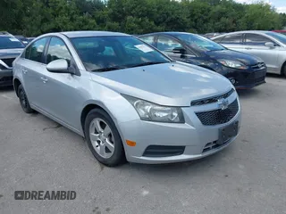 2014 Chevrolet Cruze 1LT with VIN 1G1PC5SB8E7410649, listed as a IAAI auction lot 42582375 with 228,772 mi miles and . Bid and sale history available at DreamBid. Image 1.
