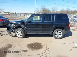 2015 Jeep Patriot Sport with VIN 1C4NJPBB8FD399932, listed as a IAAI auction lot 41935017 with 92,379 mi miles. Bid and sale history available at carsss.com. Image 14.