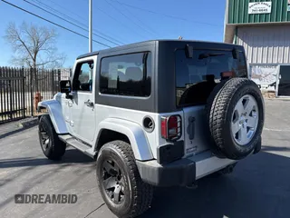 2012 Jeep Wrangler Arctic z VIN 1C4AJWBG2CL229572, wystawiony jako Copart lot #48719465 z przebiegiem 82 619 mil mil oraz Czysty tytuł • Clean title. Historia ofert i sprzedaży dostępna na DreamBid. Obrazek 3.