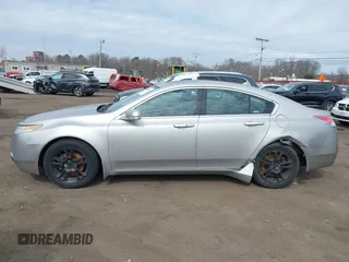 2009 Acura TL Tech with VIN 19UUA86519A013039, listed as a IAAI auction lot 41656570 with 241,217 mi miles. Bid and sale history available at carsss.com. Image 14.