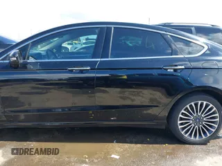 2017 Ford Fusion Titanium with VIN 3FA6P0SU0HR277268, listed as a IAAI auction lot 41798990 with 140,452 mi miles and . Bid and sale history available at DreamBid. Image 15.