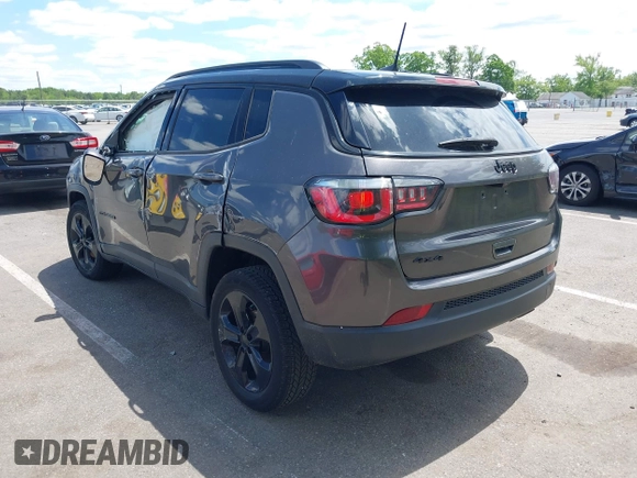 2018 Jeep Compass Latitude with VIN 3C4NJDBB0JT454598, listed as a IAAI auction lot 42318972 with 42,848 mi miles and . Bid and sale history available at DreamBid. Image 3.