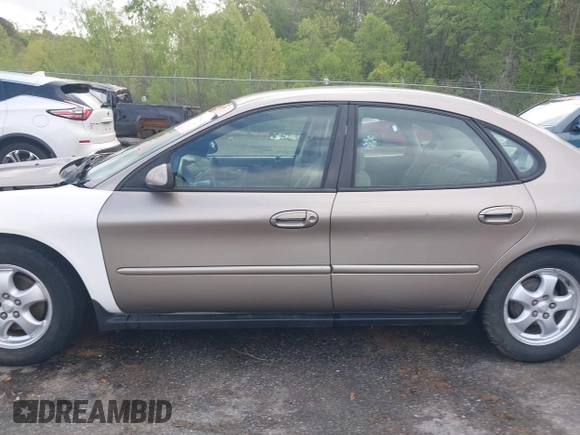 2003 Ford Taurus SE Standard with VIN 1FAFP53U63G125751, listed as a IAAI auction lot 41933803 with 196,710 mi miles. Bid and sale history available at carsss.com. Image 15.