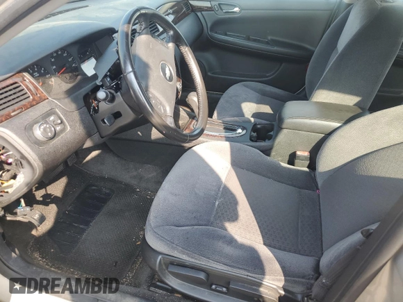 2012 Chevrolet Impala LS Fleet with VIN 2G1WF5E31C1221875, listed as a Copart auction lot 59107735 with 192,225 mi miles and Salvage title. Bid and sale history available at DreamBid. Image 7.