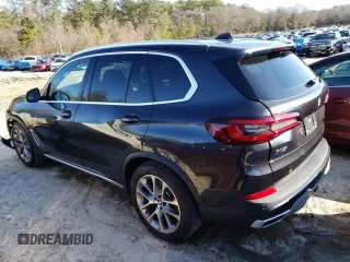 2022 BMW X5 xDrive40i with VIN 5UXCR6C08N9L71412, listed as a Copart auction lot 71472332 with 8,977 mi miles. Bid and sale history available at carsss.com. Image 2.