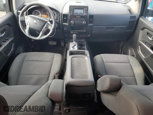 2015 Nissan Titan Pro-4X with VIN 1N6AA0EC1FN512072, listed as a Copart auction lot 85733174 with 92,460 mi miles and Salvage title. Bid and sale history available at DreamBid. Image 8.