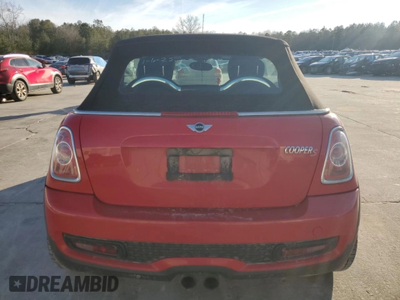 2013 MINI Convertible S with VIN WMWZP3C50DT550554, listed as a Copart auction lot 88415495 with 95,295 mi miles and Salvage title. Bid and sale history available at DreamBid. Image 6.