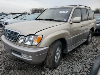 1998 Lexus LX 470 with VIN JT6HT00W9W0016986, listed as a Copart auction lot 43153305 with 121,686 mi miles and Salvage Title. Bid and sale history available at DreamBid. Image 1.