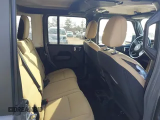2022 Jeep Wrangler Unlimited Sport with VIN 1C4HJXDN7NW156538, listed as a IAAI auction lot 41526074 with 27,082 mi miles and . Bid and sale history available at DreamBid. Image 8.