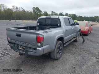 2017 Toyota Tacoma SR5 with VIN 5TFAZ5CN3HX035326, listed as a IAAI auction lot 41940372 with 284,065 mi miles. Bid and sale history available at carsss.com. Image 4.