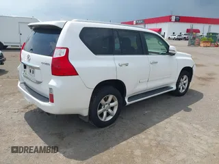 2011 Lexus GX 460 with VIN JTJBM7FX2B5020635, listed as a IAAI auction lot 42663871 with 198,909 mi miles and . Bid and sale history available at DreamBid. Image 4.